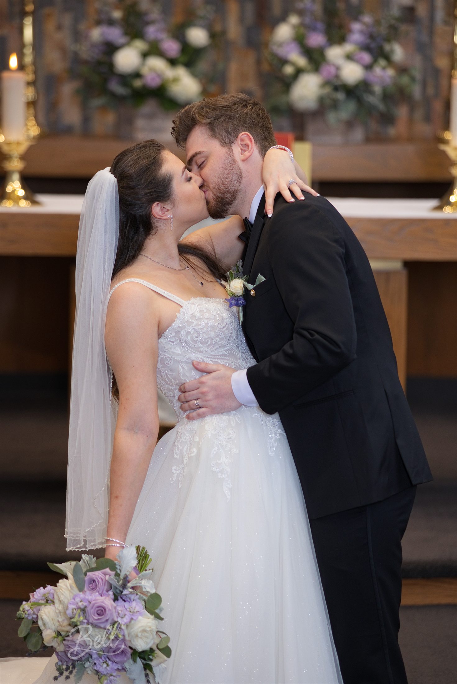 Brennan and his wife kissing at their wedding ceremony